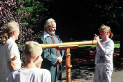 Galileo impersonator Mike Francis showing telescope
